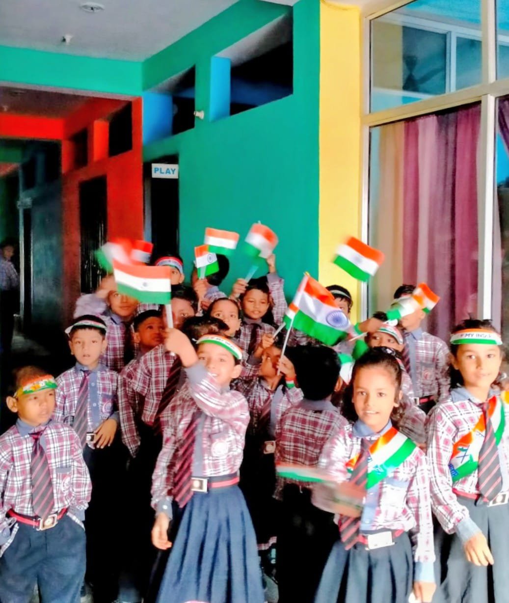 Students waving Indian flags