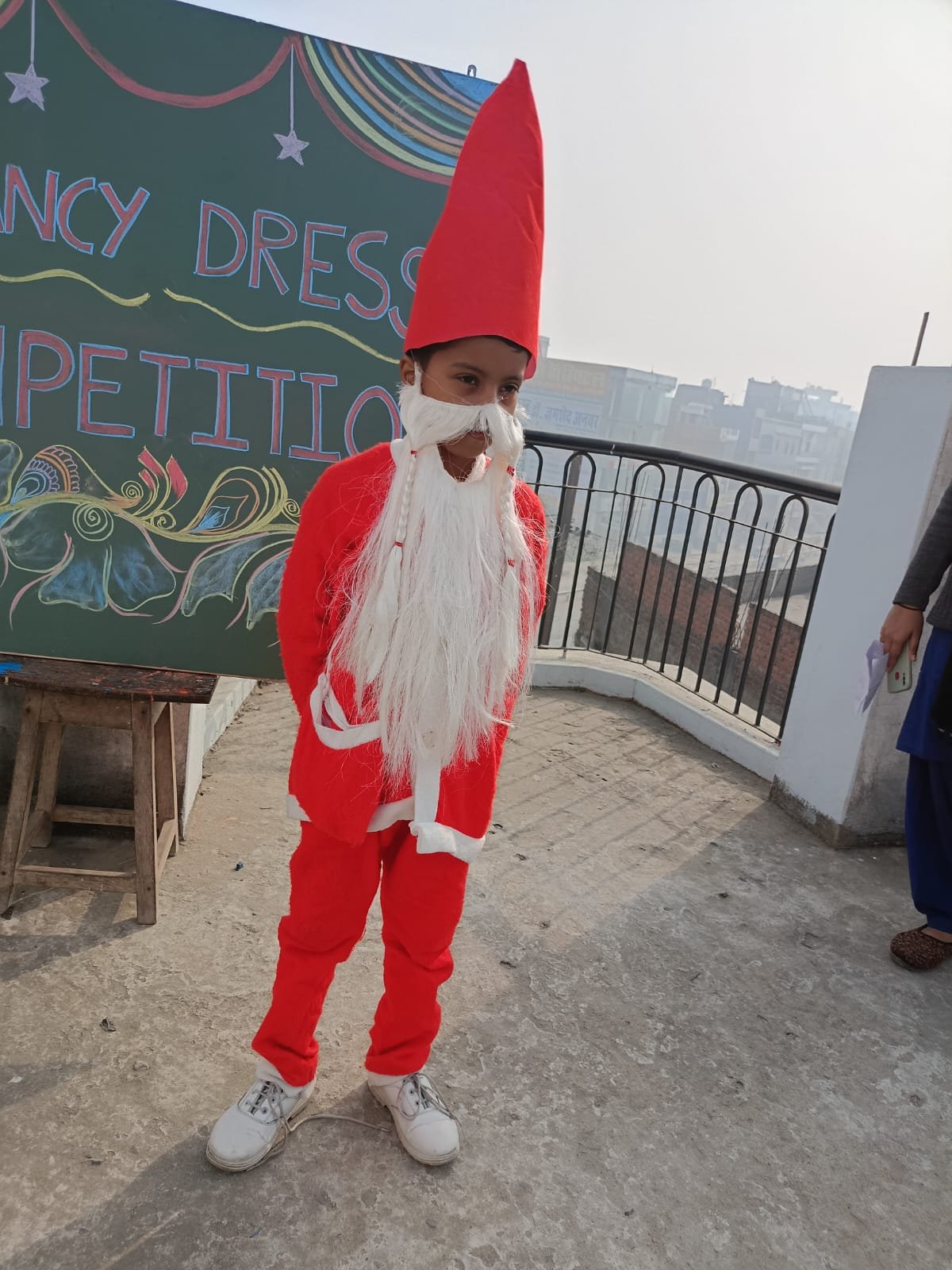 Child dressed as Santa Claus